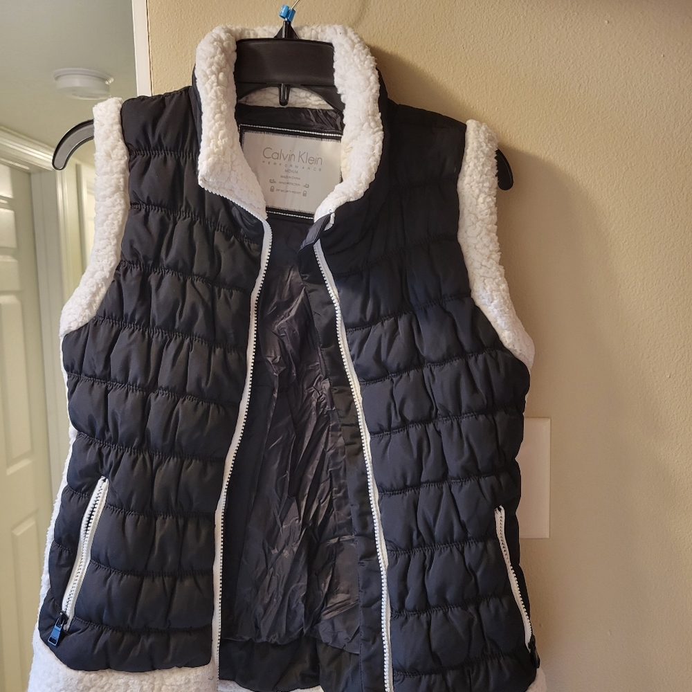 Winter West by Calvin Klein. Medium size. Color Black.